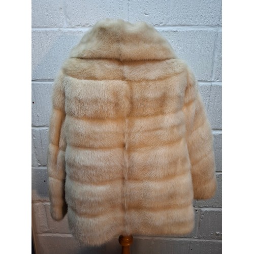 43 - A vintage arctic mink swing jacket with ¾ length flared sleeves, approx 36