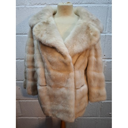 43 - A vintage arctic mink swing jacket with ¾ length flared sleeves, approx 36
