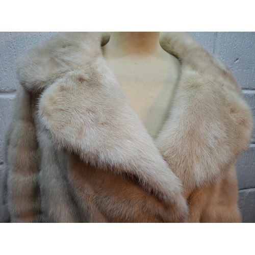 43 - A vintage arctic mink swing jacket with ¾ length flared sleeves, approx 36