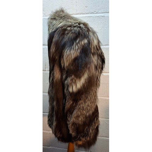 44 - A late 20th century wolf fur jacket with internal pocket embroidered with the letter 'D' and a coat ... 