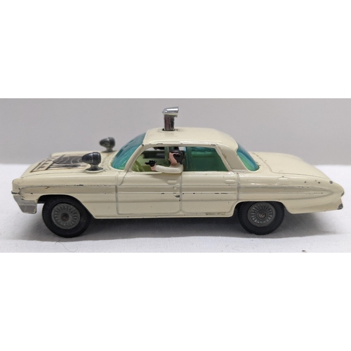 50 - Corgi Toys 497 Oldsmobile Super 88 model from The Man from UNCLE with a white body and cream interio... 