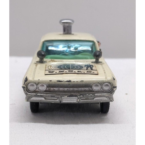 50 - Corgi Toys 497 Oldsmobile Super 88 model from The Man from UNCLE with a white body and cream interio... 