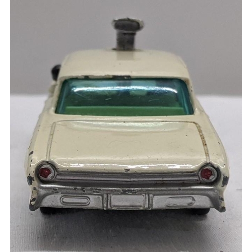 50 - Corgi Toys 497 Oldsmobile Super 88 model from The Man from UNCLE with a white body and cream interio... 