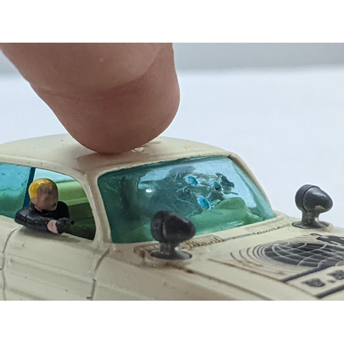 50 - Corgi Toys 497 Oldsmobile Super 88 model from The Man from UNCLE with a white body and cream interio... 