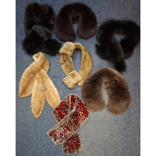 44 - A late 20th century wolf fur jacket with internal pocket embroidered with the letter 'D' and a coat ... 