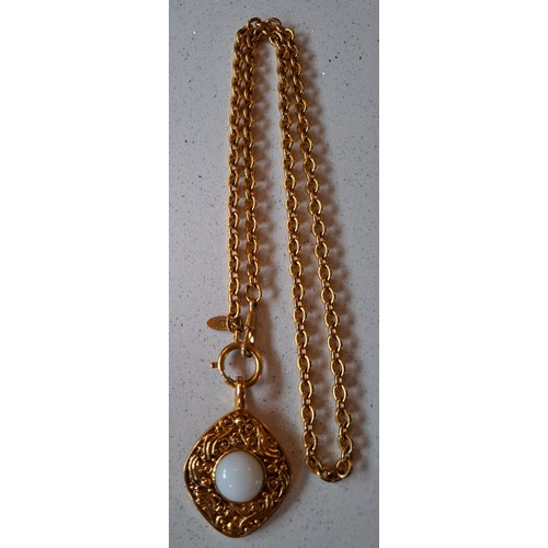1 - Chanel-A 1980's gold tone necklace having an open link chain and rhombus shaped pendant with central... 