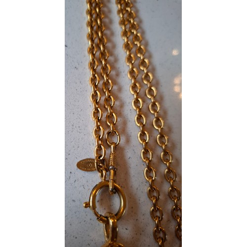 1 - Chanel-A 1980's gold tone necklace having an open link chain and rhombus shaped pendant with central... 