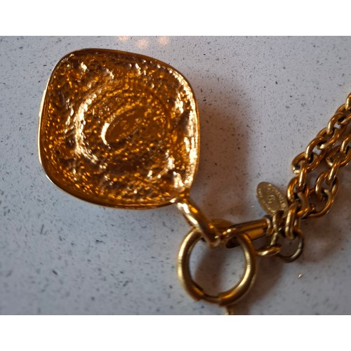 1 - Chanel-A 1980's gold tone necklace having an open link chain and rhombus shaped pendant with central... 