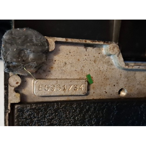 37 - A 1951 Singer 221K electric featherweight sewing machine in original fitted case with accessories an... 