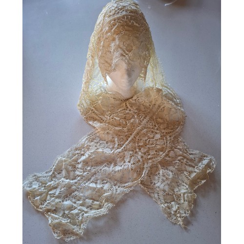 40 - A late 19th Century Maltese cream lace wedding veil A/F with characteristic Maltese cross design app... 