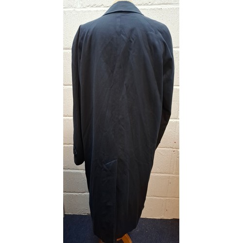13 - Burberrys- A late 20th Century navy Camden Heritage car coat, size 46 long with navy tartan lining. ... 