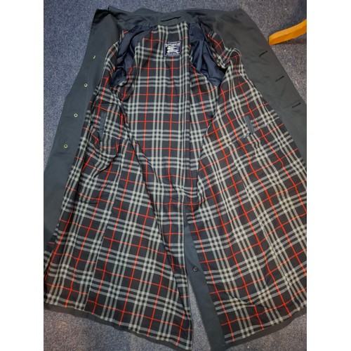 13 - Burberrys- A late 20th Century navy Camden Heritage car coat, size 46 long with navy tartan lining. ... 