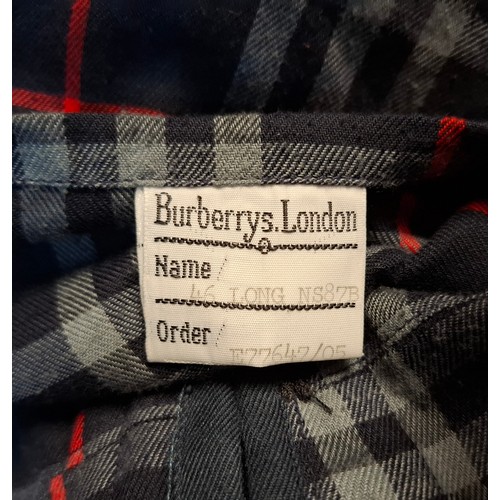 13 - Burberrys- A late 20th Century navy Camden Heritage car coat, size 46 long with navy tartan lining. ... 