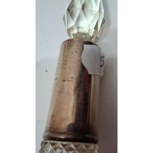 39 - A collection of 10 mixed cut glass dressing table scent bottles and jars, all with silver collars/li... 