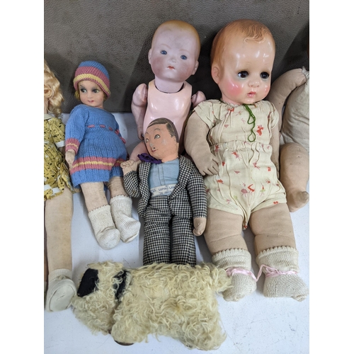 46 - Six dolls and a large collection of accessories and clothing, one of the dolls - A gentleman 011 Lup... 