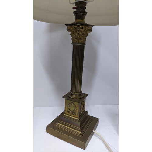 1 - A brass table lamp in the form of Corinthian Column with a reeded cylindrical centre and on a steppe... 