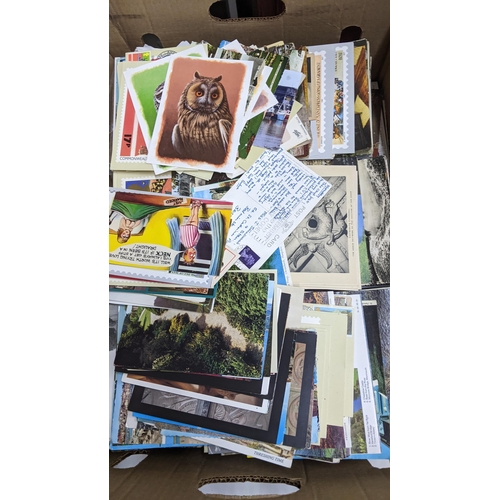 5 - A large mixed lot containing postcards, stamp albums and cigarette cards
Location: A1F
If there is n... 