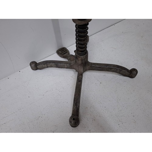 29 - An American Fusion USA tan calico shop mannequin/torso in male form on an adjustable cast metal base... 