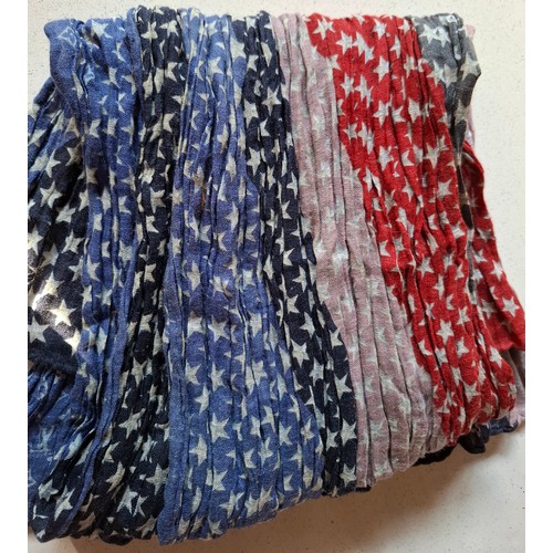 18 - Louis Vuitton- A 2005 ruched silk and linen mix scarf depicting red, white and blue stars and LV mon... 