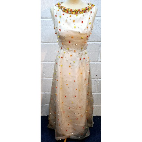 11 - Hardy Amies- A vintage cream sleeveless ball gown A/F approx 32