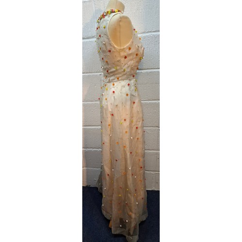 11 - Hardy Amies- A vintage cream sleeveless ball gown A/F approx 32