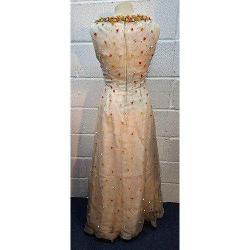 11 - Hardy Amies- A vintage cream sleeveless ball gown A/F approx 32