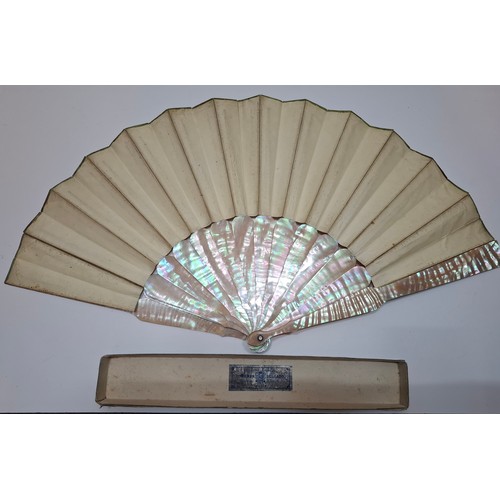 31 - H Bach, Madrid- A 19th century painted fan, the paper leaf decorated with an 18th century goat herde... 