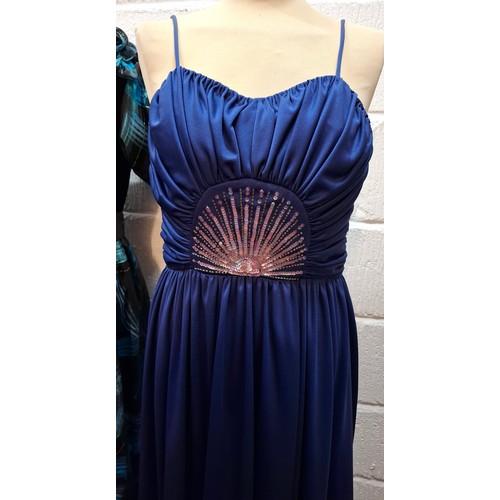 34 - Three 1970's/80's ball gowns comprising a Trina Lewis & Marjon Couture navy dress with pink sequin s... 