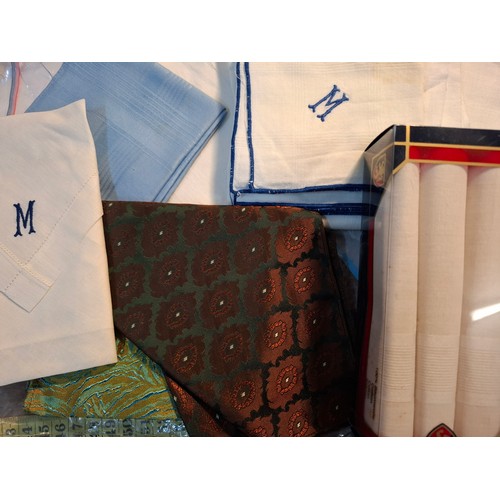 33 - Aquascutum- A navy trench coat, sold at Harrods, size 38 Short, having a tartan lining together with... 