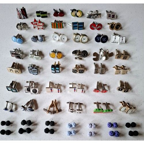 35 - Three pairs of Paul Smith cufflinks, a pair of silver tone Dunhill cufflinks and others to include n... 