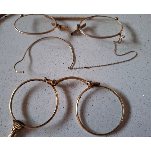 60 - Three pairs of early 20th Century yellow metal spectacles and a faux tortoiseshell pair
Location: A4... 