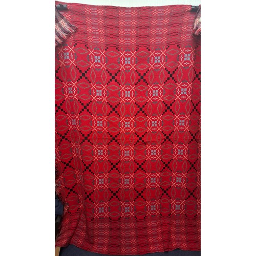 61 - A 1960's red ground Gilmores Village Weave reversible wool blanket, approx 66