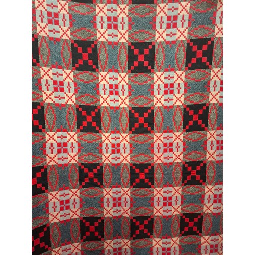 61 - A 1960's red ground Gilmores Village Weave reversible wool blanket, approx 66
