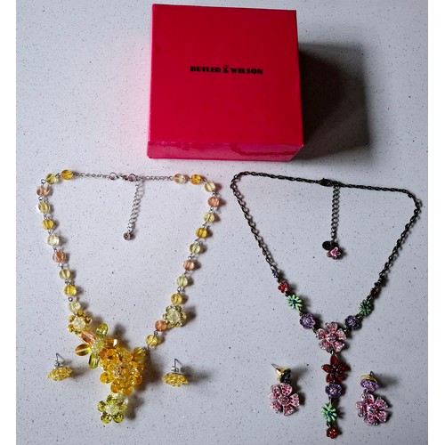 29 - Butler & Wilson- Two floral suites comprising a yellow crystal floral necklace on silver tone chain ... 