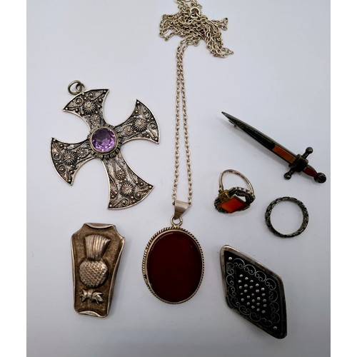 54 - A small quantity of silver and white metal jewellery to include a diamond shaped brooch stamped 800,... 