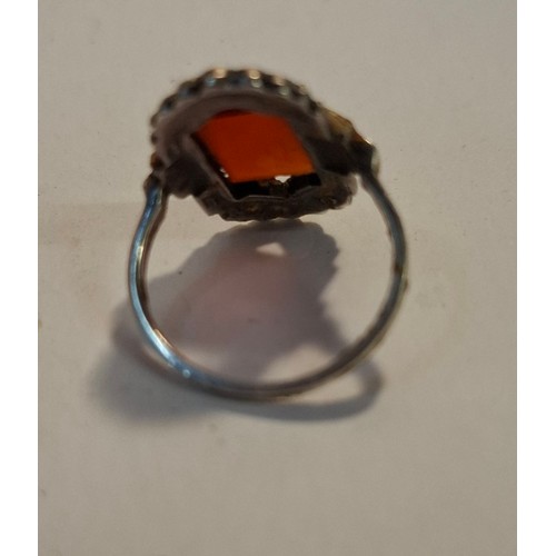 54 - A small quantity of silver and white metal jewellery to include a diamond shaped brooch stamped 800,... 