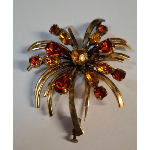 56 - A Sharmaine of Paris gold plated floral brooch with inset amber and citrine coloured glass stones, a... 