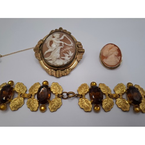 55 - A Victorian swivel cameo brooch in a gold plated mount, a 20th Century silver set cameo brooch and a... 