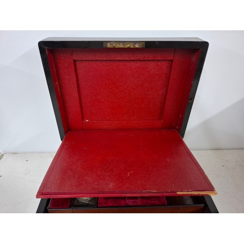 52 - A Georgian rosewood dressing box A/F with fitted interior, key and contents to include glass bottles... 