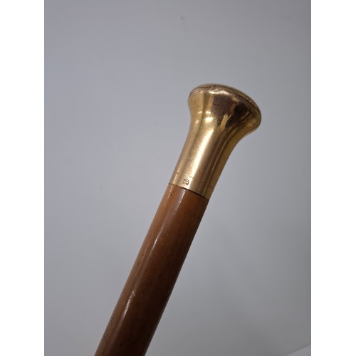 40 - A Briggs London black umbrella with inset pencil having a gold tone collar signed Briggs together wi... 