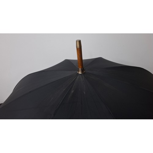 40 - A Briggs London black umbrella with inset pencil having a gold tone collar signed Briggs together wi... 