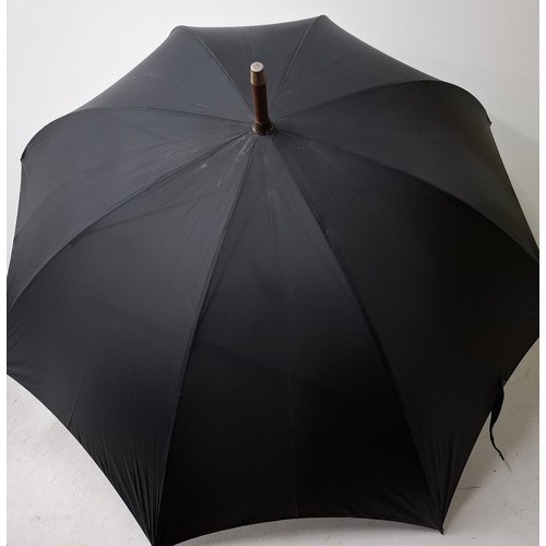 40 - A Briggs London black umbrella with inset pencil having a gold tone collar signed Briggs together wi... 