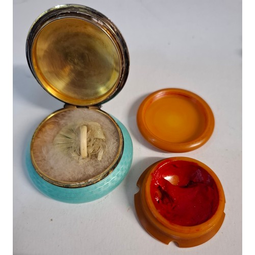 26 - An early 20th Century blue and white enamel powder pot, a silver overlay scent bottle, a cheroot, a ... 