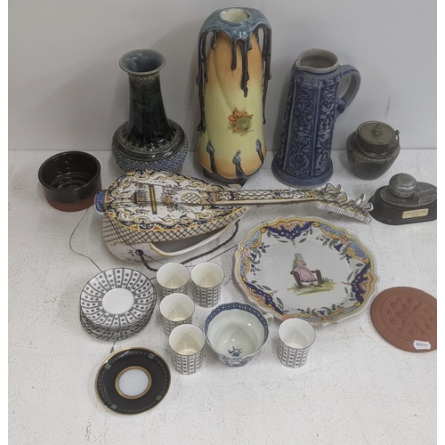 62 - A collection of ceramics to include a Majolica wall pocket fashioned as a mandolin, a late 18th cent... 