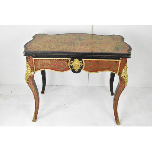 202 - A mid 19th century French Louis XV style ebonised and red tortoiseshell boulle card table, of serpen... 