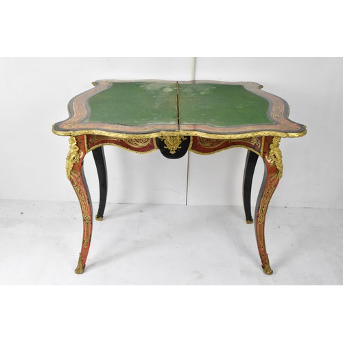 202 - A mid 19th century French Louis XV style ebonised and red tortoiseshell boulle card table, of serpen... 