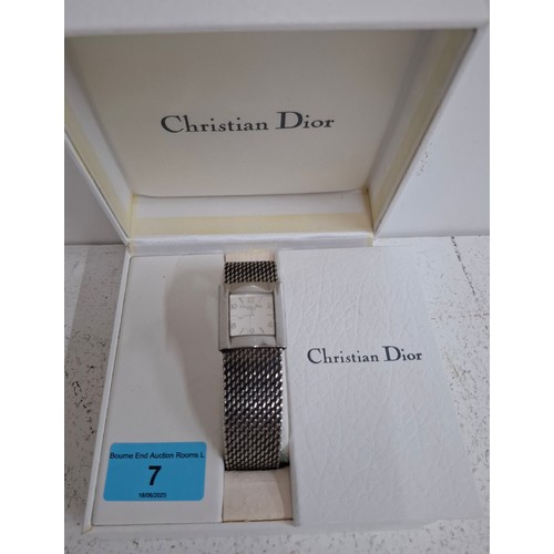 7 - Christian Dior- A unisex stainless steel battery operated wristwatch model D79-100 with square dial ... 