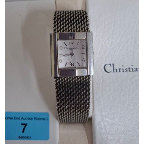 7 - Christian Dior- A unisex stainless steel battery operated wristwatch model D79-100 with square dial ... 