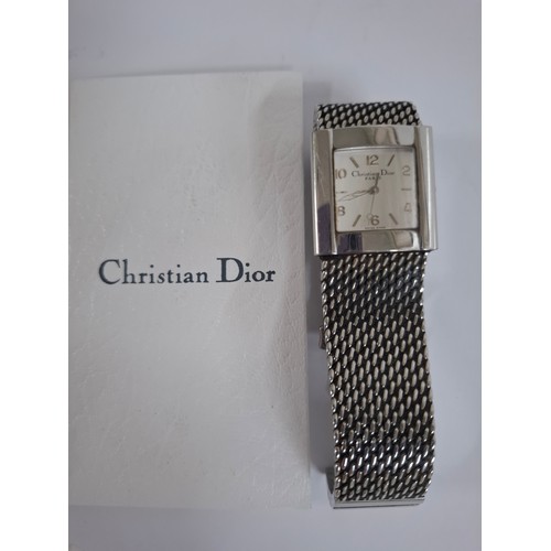 7 - Christian Dior- A unisex stainless steel battery operated wristwatch model D79-100 with square dial ... 