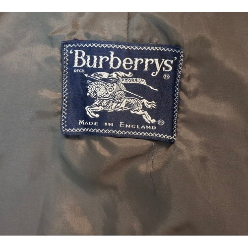 8 - Burberrys- A late 20th Century gents beige trench coat 46